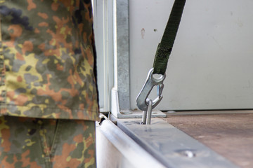 German army soldier lashed cargo with lashing material