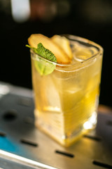 Cocktail on the bar blurred background