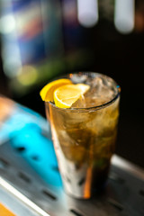 Cocktail on the bar blurred background