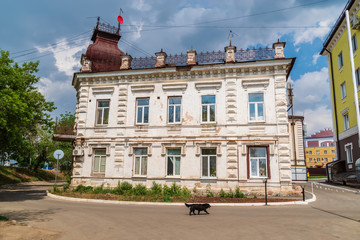 Orenburg, Russia - June, 1, 2019: Facade of an old dilapidated house on Naberezhnaya street