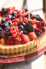 Shortcake with blueberries, strawberries and currants