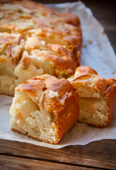 Fresh cakes. Apple pie on a wooden table. Country style..