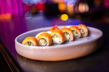 Sushi rolls with salmon and philadelphia