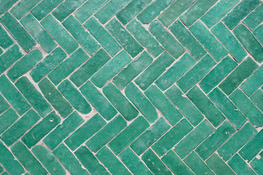 Arabic Green Herringbone Tile Pattern Background