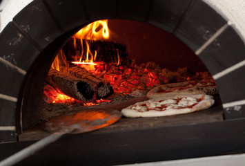 mouth-watering Italian pizza baked in a wood-burning oven