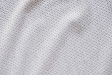 Naklejka na ściany i meble White fabric sport clothing football jersey with air mesh texture background
