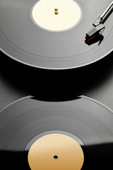 Two vinyl record on black background