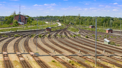 Freight railway yard with many tracks and operations control tower