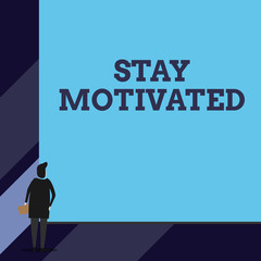 Handwriting text Stay Motivated. Conceptual photo Reward yourself every time you reach a goal with knowledge Back view young woman watching blank big rectangle. Geometrical background