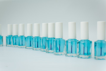 nail polishes on a white background in different compositions