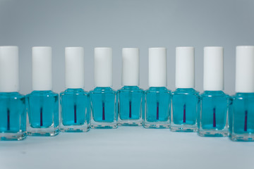 nail polishes on a white background in different compositions