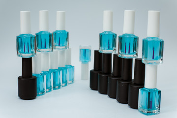 nail polishes on a white background in different compositions