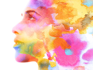 Paintography. Double exposure. Close up of an attractive model combined with colorful hand drawn...