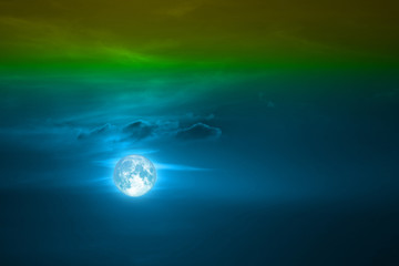 full harvest moon on dark sky back colorful cloud over space