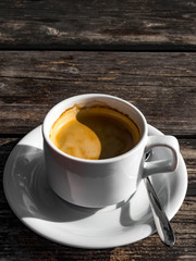 white Coffee cup on wooden table background