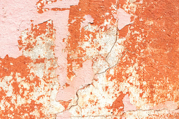 Old red cracked wall, rustic texture, design background.