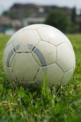 Fototapeta premium lonely soccer ball in an empty field before training