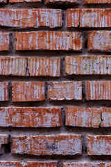 Old red brick wall, rustic texture, design vertical background.