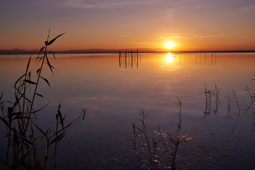 Vivid twilight sunset sky and motion blur of the sea under with long exposure effect.