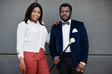 Stylish african american couple in formal wear. Romantic couple in love dating.