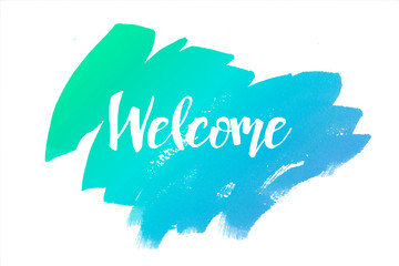 The word Welcome, in english, on the watercolor background