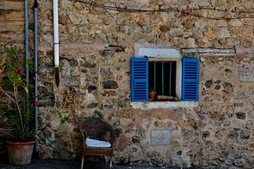 old house with window shutters