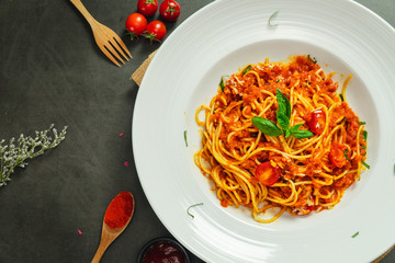 Food shot of spaghetti bolognese tomato sauce stir fried with beef