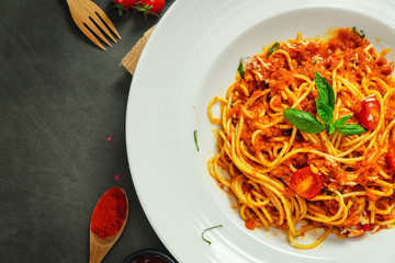 Food shot of spaghetti bolognese tomato sauce stir fried with beef