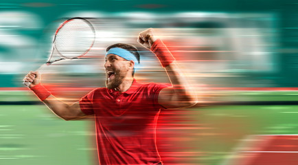 Man tennis player celebrating winner. Motion effect
