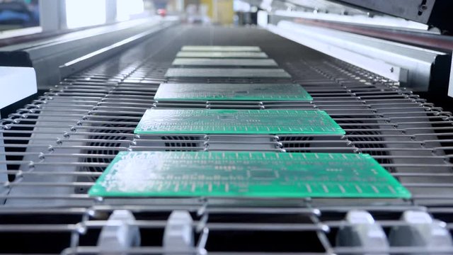 Print circuit board (pcb) on conveyor of SMT automatic pick and place machine for assembly electronic board