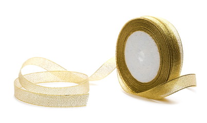 Golden ribbon and roll isolated on white background, with clipping path