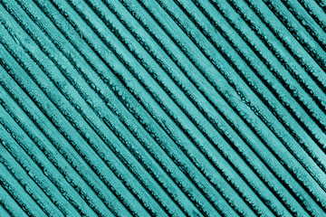 Old vintage texture of cracked blue paint on a wooden board. Old blue paint texture closeup