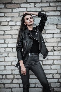 Woman in a black leather jacket