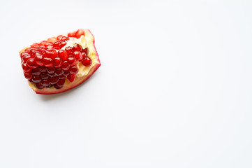 Ripe pomegranate on white background, top view