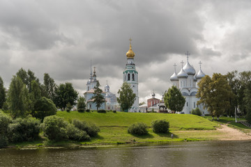 Fototapeta na wymiar View from Vologda river on Belfry, Church of Alexander Nevsky and Saint Sophia Cathedral, Vologda, Russia