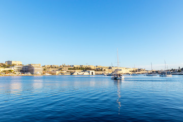 Scenic evening Valletta skyline view as seen from Manoel Island, Malta