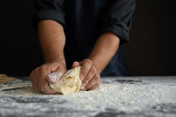 the process of kneading the dough with hands, place for text