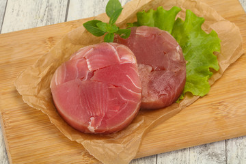 Raw tuna round steak for grill