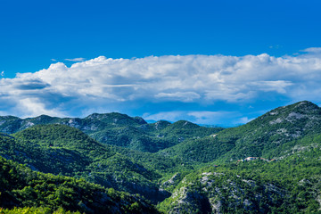 Montenegro, Forested mountains and valleys forming the black mountains of the country in skadar lake national park from above