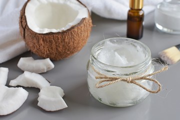 Coconut oil in glass jar for natural cosmetic
