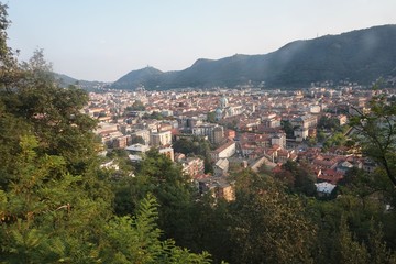 Fototapeta na wymiar View of the city and Lake Como from the height of Brunatte village