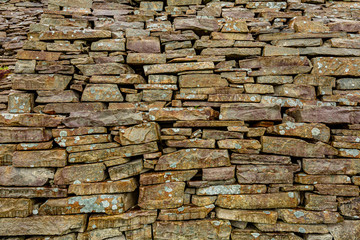 Close up of a natural limestone wall, limestone texture, geosites and geopark, spring day in the countryside in county Clare in Ireland