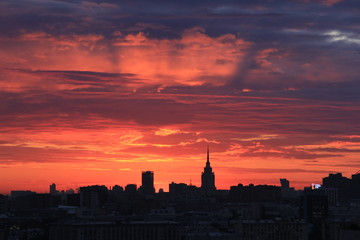 Moscow city silhouettes and symphony of bright sunset colours
