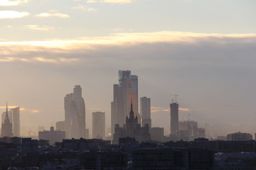 Moscow skyline at sunset. Multilayer metropolis