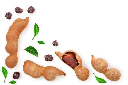 Tamarind fruit with leaf and seed isolated on white background with copy space for your text. Top view. Flat lay