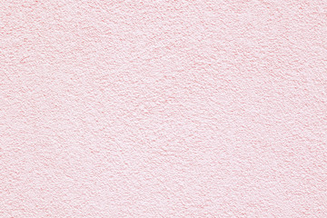Fototapeta premium light pastel pink rough wall texture