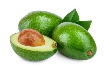 avocado and half with leaves isolated on white background close-up
