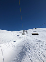 Ski lift above slope