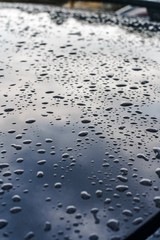 rain drops on blue car. Blur 