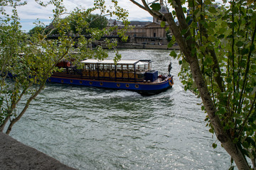 Naklejka premium Boat on Seine river 